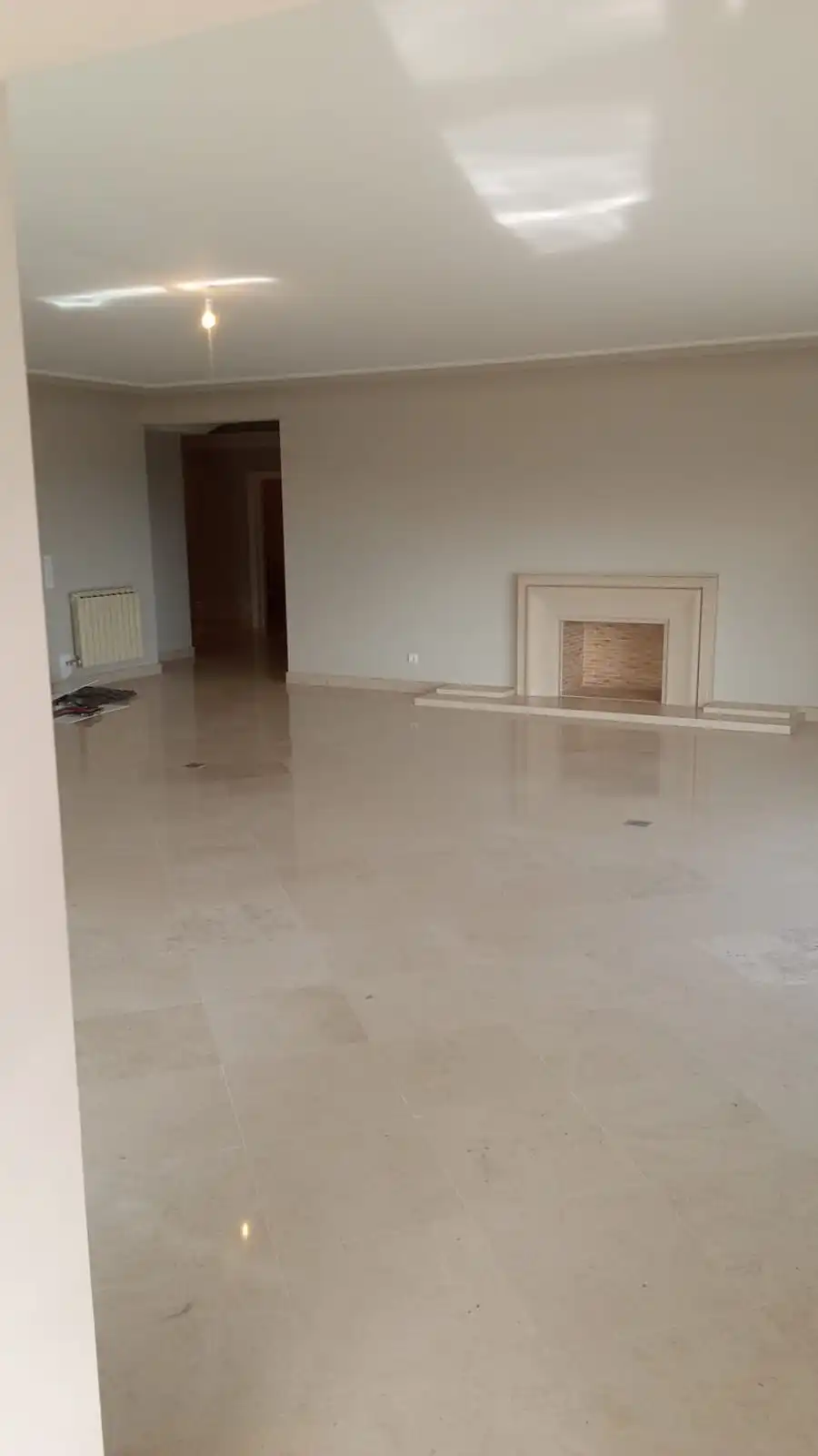 Remodelação de Sala com Lareira por Mudei a Casa - Remodelação de Interiores